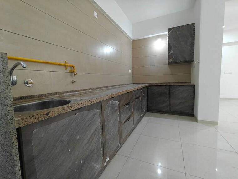 Kitchen, sun-atmosphere 3 Bedroom 1700 Sq.Ft. Apartment In Shela Ahmedabad 9949142