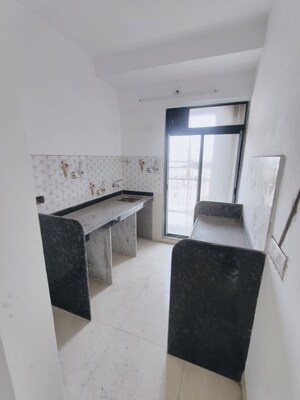 Kitchen in 1 RK Apartment at Shubham Giriraj Swastik, Kopri – for Sale