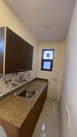 Kitchen in Studio Builder Floor at Vipul Square, Sushant Lok I – for Rent