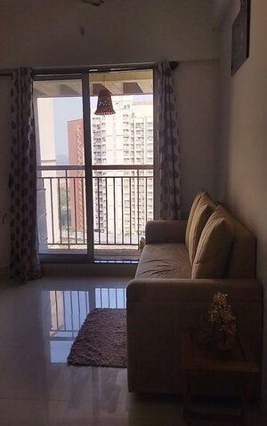 Living Room in 1 BHK Apartment at Metropolis Aquaris Phase 1, Kasarvadavali – for Rent