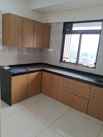 Kitchen in 2 BHK Apartment at Chandak 34 Park Estate, Goregaon West – for Rent