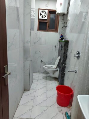 Bathroom in 4 BHK Apartment at Patrakar Parisar, Vasundhara Sector 2b – for Sale