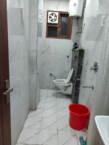Bathroom in 4 BHK Apartment at Patrakar Parisar, Vasundhara Sector 2b – for Sale