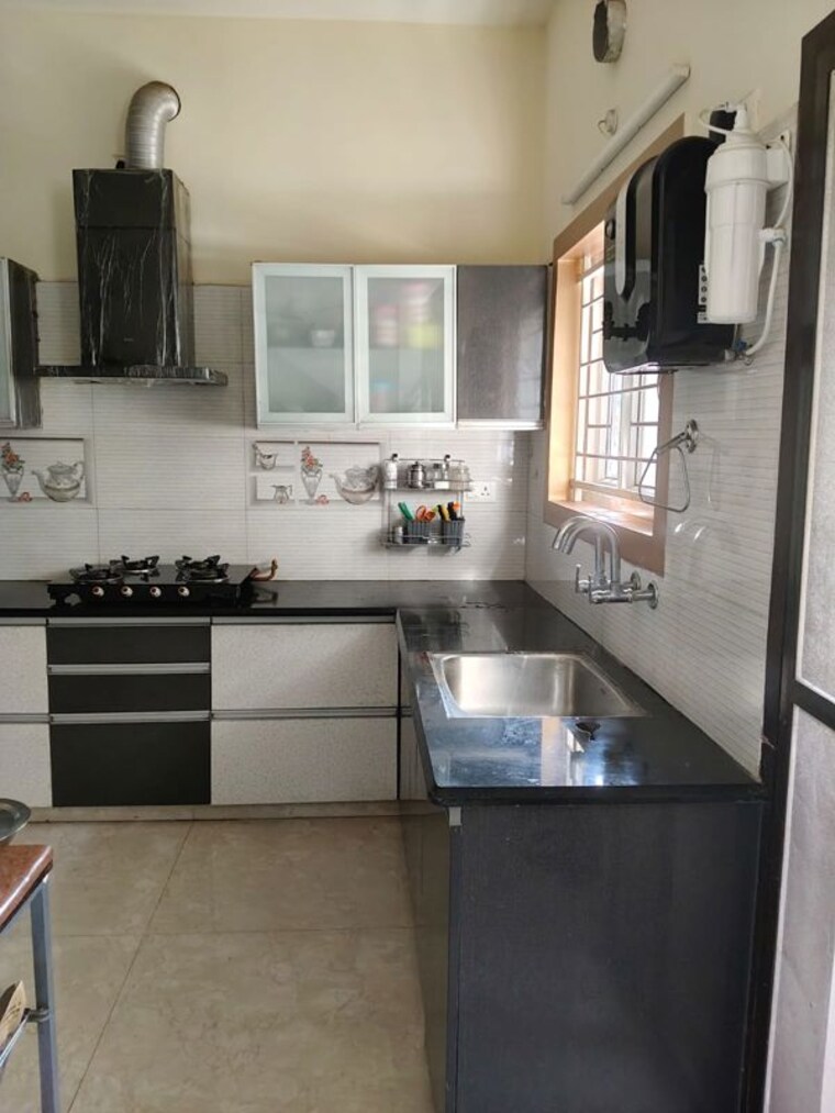 Kitchen, radiant-silver-oak 3 Bedroom 2500 Sq.Ft. Villa In Yelenahalli Bangalore 9949684