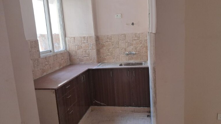 Kitchen, amrapali-golf-homes 3 Bedroom 1115 Sq.Ft. Apartment In Sector 4 Greater Noida Greater Noida 9949869