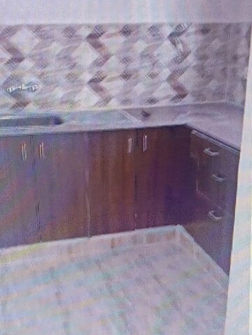 Kitchen in 2 BHK Apartment at Amrapali Golf Homes, Sector 4 Greater Noida – for Rent