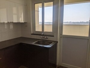 Kitchen in 3 BHK Apartment at SNN Raj Serenity, Begur Road – for Rent