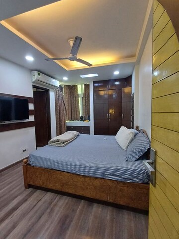 Bedroom in 2 BHK Builder Floor at Nehru Enclave – for Rent