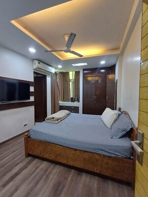 Bedroom in 2 BHK Builder Floor at Nehru Enclave – for Rent