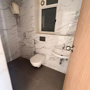 Bathroom in 2 BHK Apartment at Lodha Codename Premier, Mangaon – for Sale