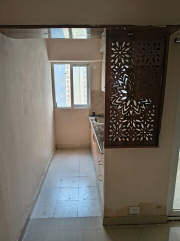 Building Lobby in 1 BHK Apartment at Amrapali Dream Valley, Tech Zone 4 Greater Noida – for Sale