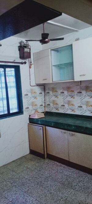 Kitchen in 1 RK Apartment at Poonam Pragati, Andheri East – for Rent