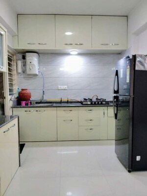 Kitchen in 2 BHK Apartment at Near Vaishno Devi Circle On Sg Highway – for Rent