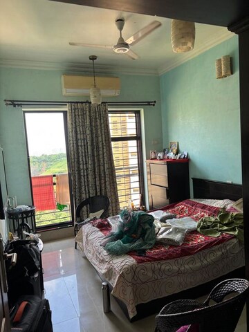 Bedroom in 3 BHK Apartment at K Raheja Heights, Malad East – for Rent