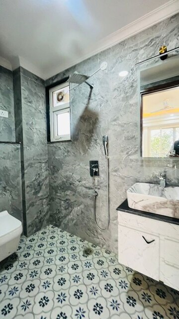 Bathroom in 3 BHK Apartment at Palm Residency Chhatarpur, Chattarpur – for Rent