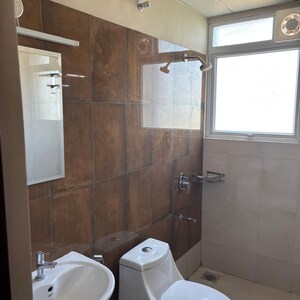 Bathroom in 2 BHK Apartment at Bhartiya Nikoo Homes Phase 2, Kannur – for Rent