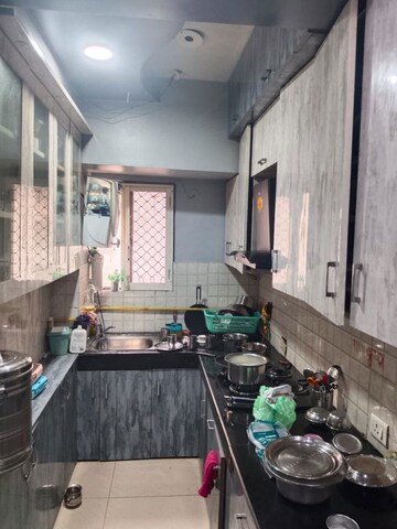 Kitchen in 4 BHK Apartment at Proview Officer City, Raj Nagar Extension – for Rent