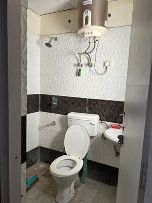 Bathroom in 1 BHK Apartment at NK Sharma Savitry Greens 2, Ghazipur – for Rent