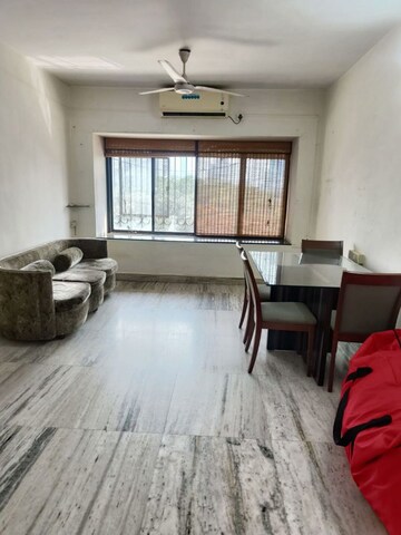 Living Room in 2 BHK Apartment at Mahim – for Sale
