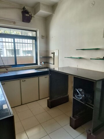 Kitchen in 2 BHK Apartment at Mahim – for Sale
