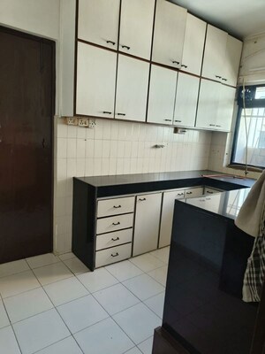Kitchen in 2 BHK Apartment at Mahim – for Sale