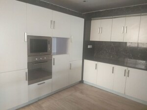 Kitchen in 3.5 BHK Apartment at Puri Pranayam, Sector 82 – for Sale