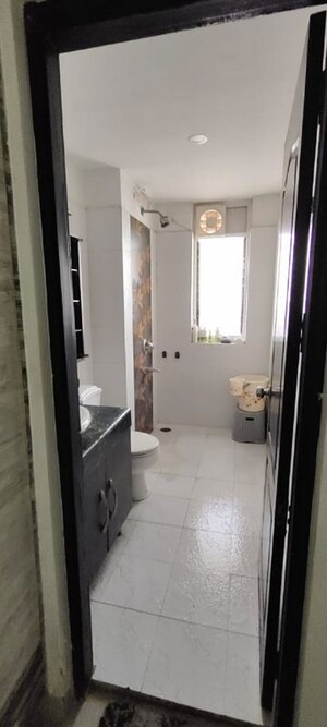 Bathroom in 4 BHK Apartment at Puri Pranayam, Sector 82 – for Sale