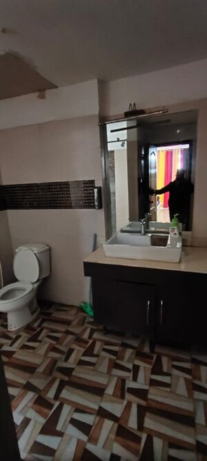 Bathroom in 4 BHK Apartment at Puri Pranayam, Sector 82 – for Sale