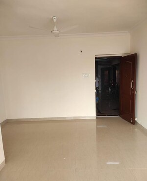 Living Room in 1 BHK Apartment at K Raheja Heights, Malad East – for Rent