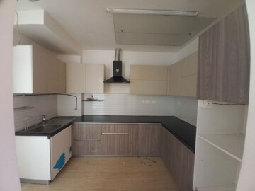 Kitchen in 3 BHK Apartment at Mahagun Mezzaria, Sector 78 – for Sale