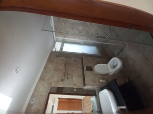Bathroom in 3 BHK Apartment at Mahagun Mezzaria, Sector 78 – for Sale
