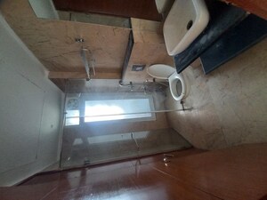 Bathroom in 3 BHK Apartment at Mahagun Mezzaria, Sector 78 – for Sale