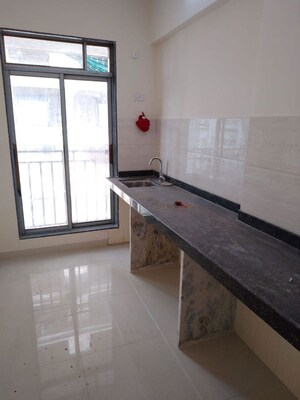 Kitchen in 1 BHK Apartment at Shivam Gulmohar, Goregaon West – for Rent