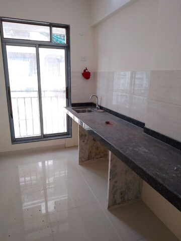 Kitchen in 1 BHK Apartment at Shivam Gulmohar, Goregaon West – for Rent