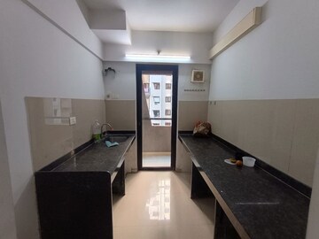 Kitchen in 1 BHK Apartment at Lodha Lakeshore Greens, Dombivli East – for Rent