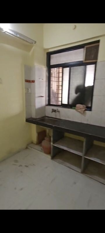 Kitchen in 2 BHK Apartment at Omkar Puram CHS, Adai – for Sale