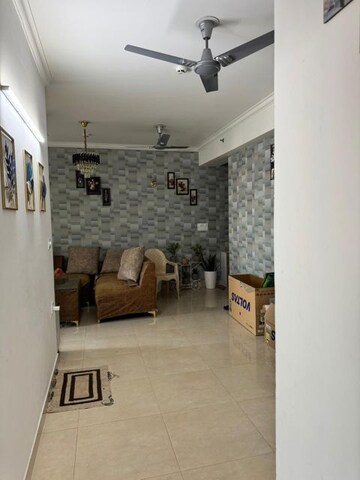 Living Room in 2 BHK Apartment at Amrapali Golf Homes, Sector 4 Greater Noida – for Sale