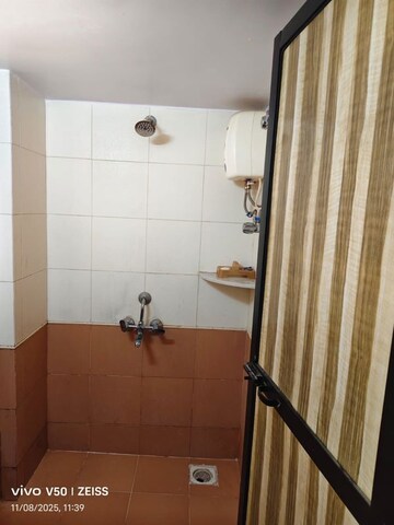Bathroom in 1 BHK Apartment at Satellite Garden, Goregaon East – for Rent