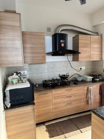 Kitchen in 2 BHK Apartment at Amrapali Golf Homes, Sector 4 Greater Noida – for Sale