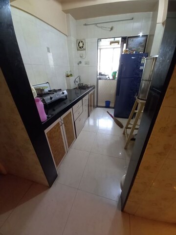 Kitchen in 1 BHK Apartment at Satellite Garden, Goregaon East – for Rent