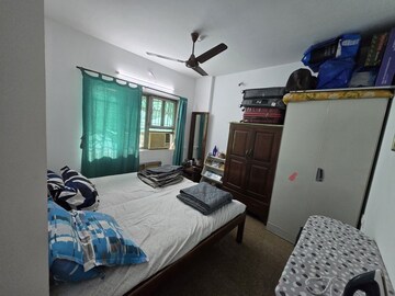 Bedroom in 1 BHK Apartment at Atlanta CHS, Malad West – for Rent