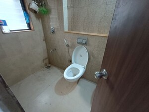 Bathroom in 2 BHK Apartment at Lodha Lakeshore Greens, Dombivli East – for Rent