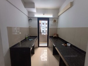 Kitchen in 2 BHK Apartment at Lodha Lakeshore Greens, Dombivli East – for Rent