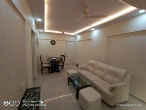 Living Room in 1 BHK Apartment at Manali Building, Malad West – for Rent