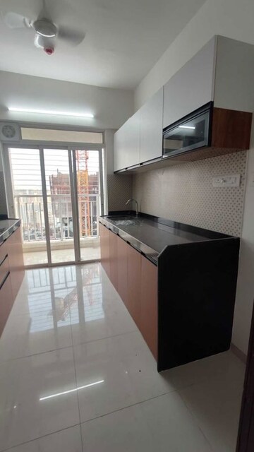 Kitchen in 2 BHK Apartment at Lodha Amara, Kolshet Road – for Rent