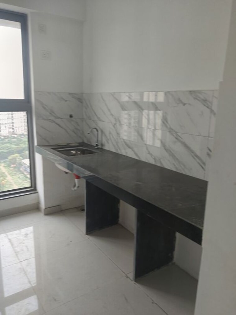 Kitchen, uk-iridium 1 Bedroom 410 Sq.Ft. Apartment In Kandivali East Mumbai 9953356