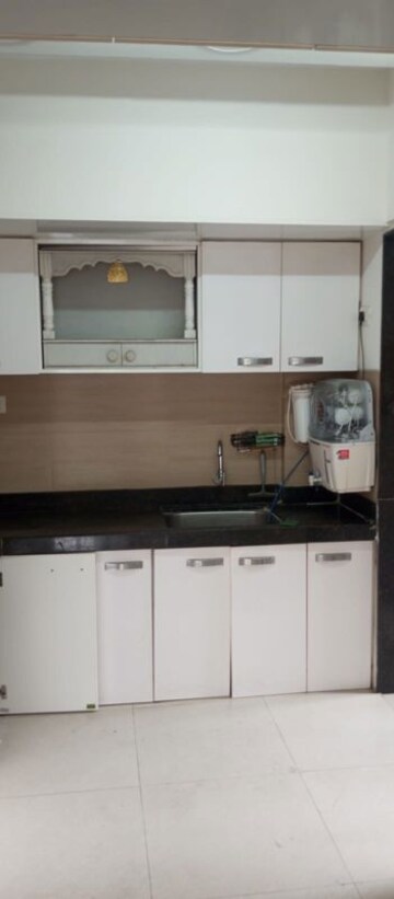 Kitchen in 3 BHK Apartment at Acme Ozone, Manpada – for Rent