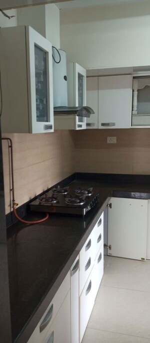 Kitchen in 3 BHK Apartment at Acme Ozone, Manpada – for Rent