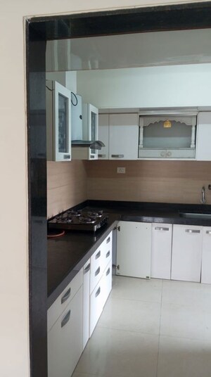Kitchen in 3 BHK Apartment at Acme Ozone, Manpada – for Rent