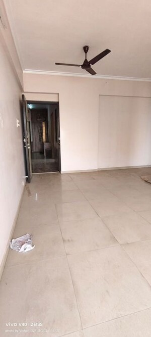 Living Room in 2 BHK Apartment at Coral Heights, Kavesar – for Rent